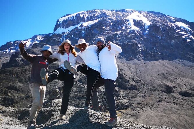 6 Days Kilimanjaro climb - Marangu route - Day 6: Mweka Gate certificates, muddy trails, and back to Moshi