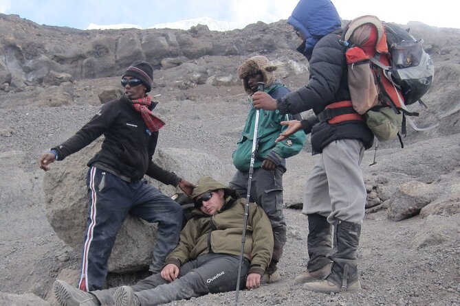7 Days Kilimanjaro via Machame route affordable price - Day 1: Moshi to Kilimanjaro National Park Gate, rainforest mud and permit time