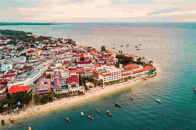 A Half Day Private Stone Town Tour - Getting picked up and moving through narrow streets