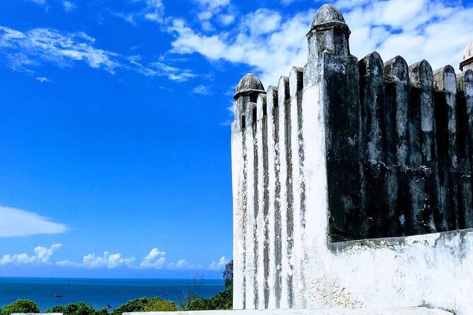 Ancient Bagamoyo City Day Tour - Stop 3: Old Boma by the beach, customs, and trade strategy