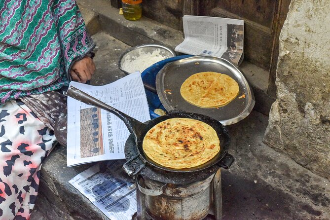 Authentic Street Food Tours in Stone Town, Zanzibar - The food lineup: sambuusa, carlisi, chapati, uji, tende shake, Zanzibar pizza