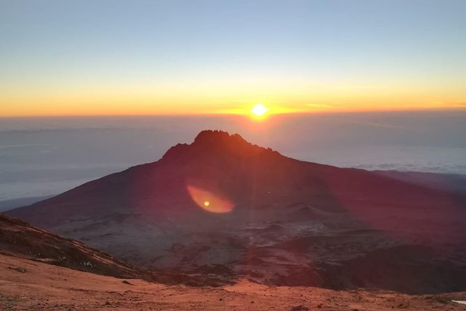Best Kilimanjaro Adventure 7 days Machame route Trekking - Day 6: Summit night after midnight, sunrise over the Great Rift Valley, then descent to Mweka