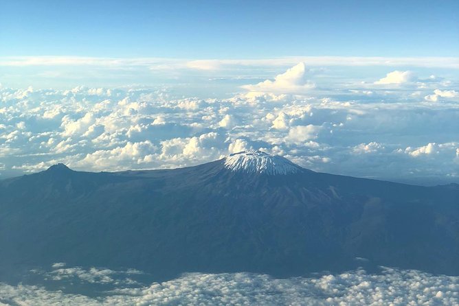 Best Kilimanjaro hiking day trip tour with Kilinge Adventures - Rain, clouds, and the reality of a 10-hour day