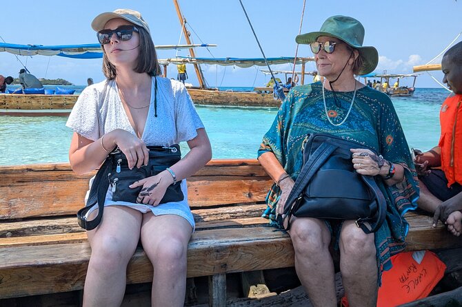 Blue Safari Full Day Private Trip Zanzibar With Sea Food BBQ - Kwale Island: seafood BBQ, a baobab tree, and a natural pool