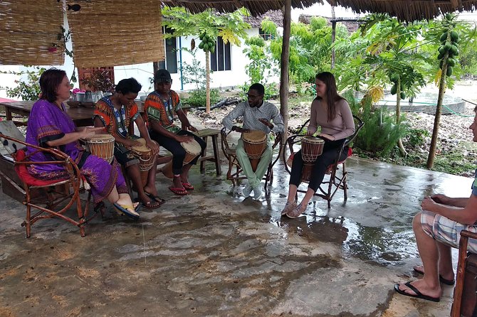 Cave Tour & Rock Restaurant Visit - Stop 2, Kuza Cave: artifacts, a mineral-water pool, and Swahili music