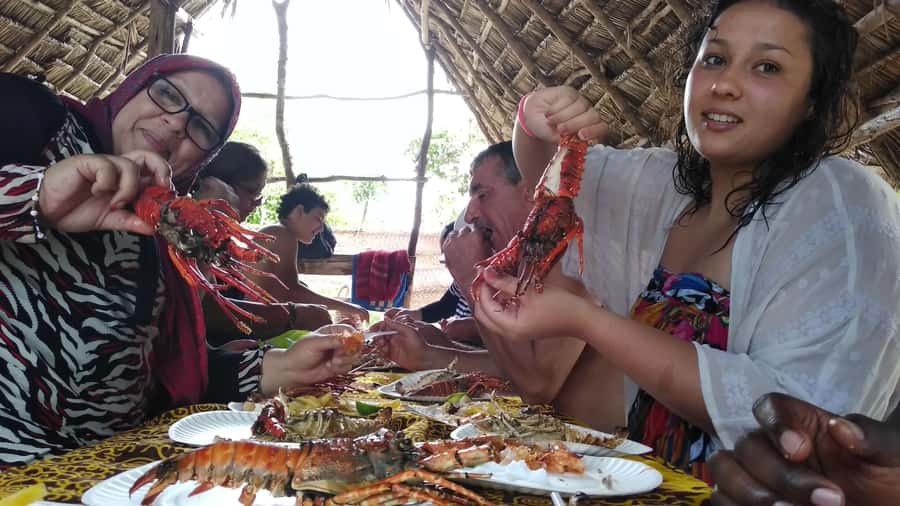 From Stone Town: Sandbank picnic with sea food BBQ Lunch - Sailing to the Kwale coral reef on a traditional dhow