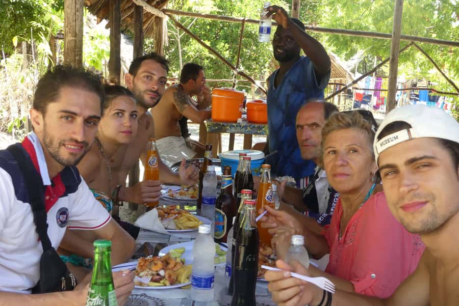 From Stone Town: Sandbank picnic with sea food BBQ Lunch - What the guide experience looks like in real life