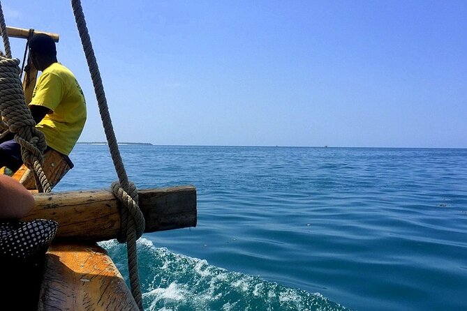 Full-Day Blue Lagoon and Sandbank Boat Tour from Zanzibar ( Safari blue) - From city crowds to dhow life, fast