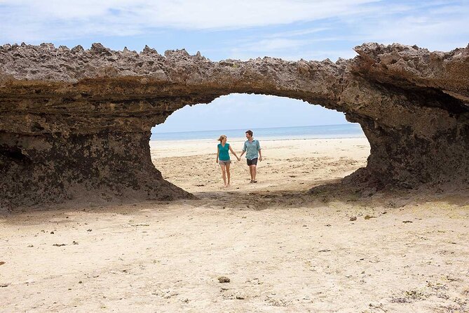 Full-Day Blue Lagoon and Sandbank Boat Tour from Zanzibar ( Safari blue) - Kwale Island: baobab climbing and shoreline time