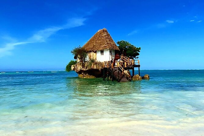 Full-day Tour Mnemba Jozani Forest Kuza Cave Paje Beach The Rock - Paje Beach Hour: Sun, Swim, and That Laid-Back East Coast Mood