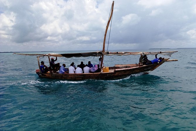 Kwale Island Dhow Sailing Tour from Zanzibar with Seafood Lunch - Lunch on Kwale Island: seafood BBQ, Zanzibar sauces, and fruit