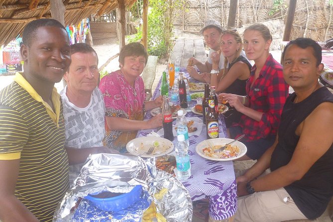 Kwale Island Dhow Sailing Tour from Zanzibar with Seafood Lunch - The ancient baobab tree walk: legs on land after time in the water