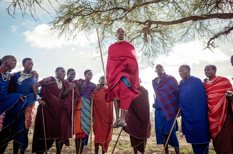 Maasai Boma Cultural Experience (maasai village tour) - Stepping into a Maasai boma, with songs and shuka dressing