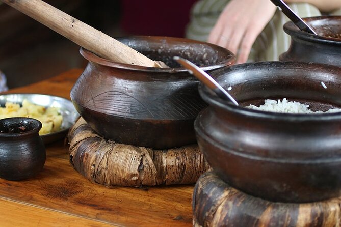 Maasai village visit, Materuni waterfalls & coffee experience - Lunch in a Chagga Home, Banana Wine, and Coffee Culture in Motion