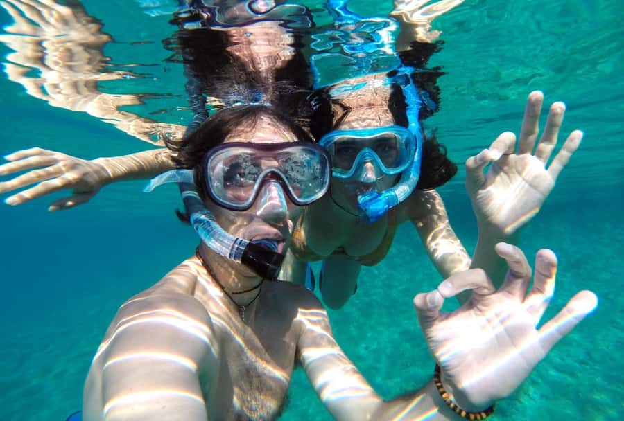 Matemwe: Mnemba Island Dolphin & Snorkeling Boat Trip - Mnemba Island Photo Stop and Guided Time: Why This Part Matters