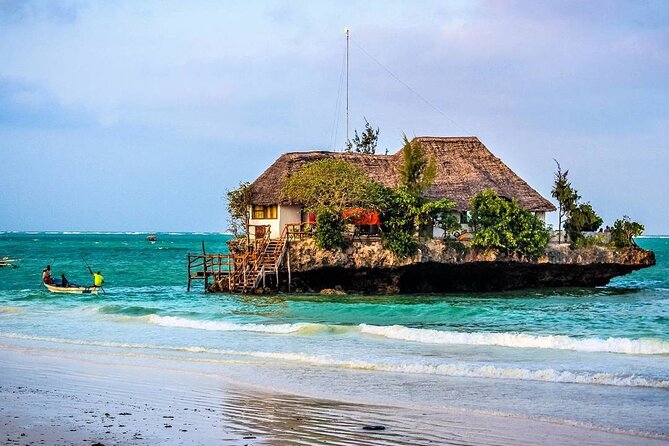 Mnemba Snorkeling; Kuza Cave; Paje Beach; The Rock; Salaam Cave - Stop 2: Kuza Cave for limestone formations, Swahili history, and a cave swim