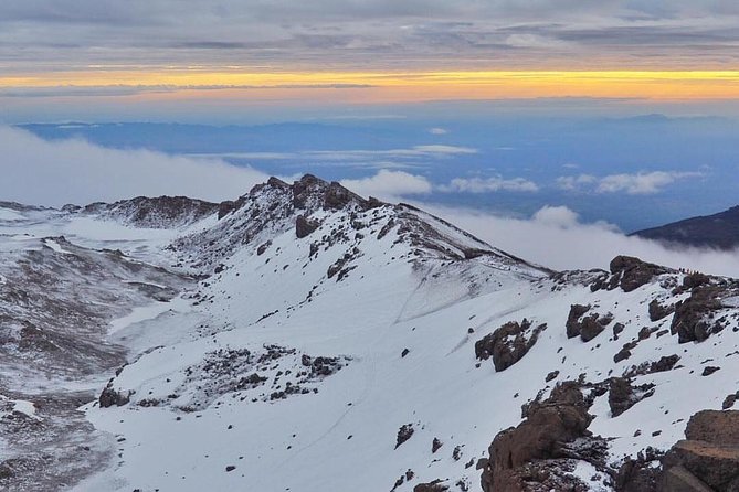 Mt Kilimanjaro 6 days Marangu route hike - Day 1: Rainforest to Mandara Encampment, Plus Maundi Crater