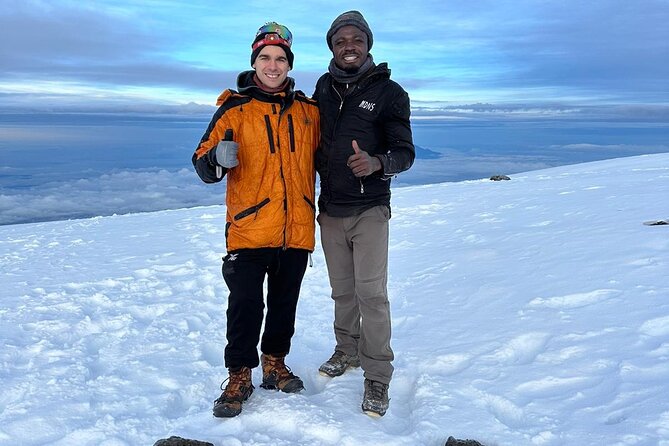 One Kilimanjaro Day hike Tour ISMANI TOURS AND SAFARIS - The Descent Back to Marangu Gate: Fast Legs, Careful Feet