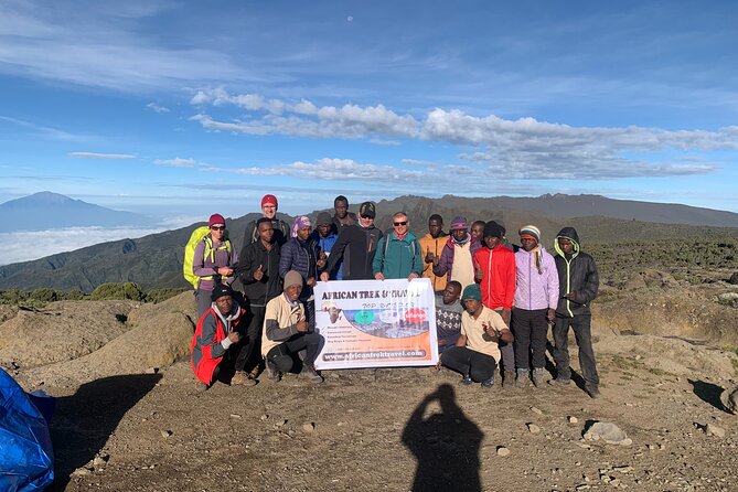 Private 7 Days Kilimanjaro Climbing via Lemosho Route - Day 7 descent to Mweka Gate, certificates, and a muddy finish