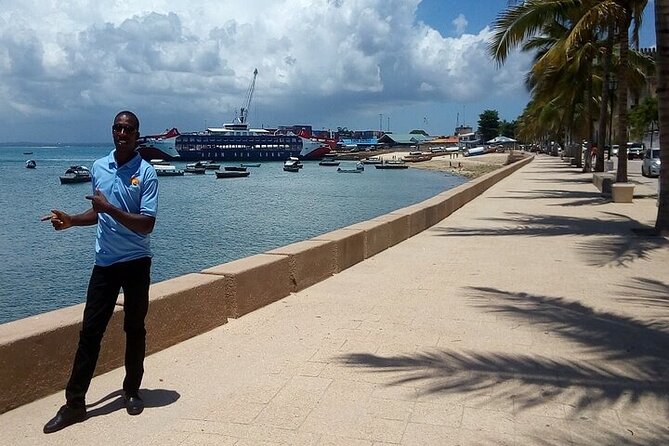 Stone town historical tour + Spice farm tour - Entering Stone Town through the House of Wonders