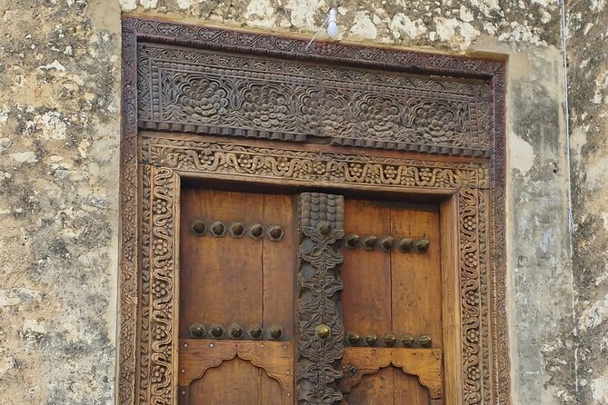 Stone Town Secrets: A walking Tour Zanzibar - Freddie Mercury Statue and Museum: Pop Culture With Local Roots