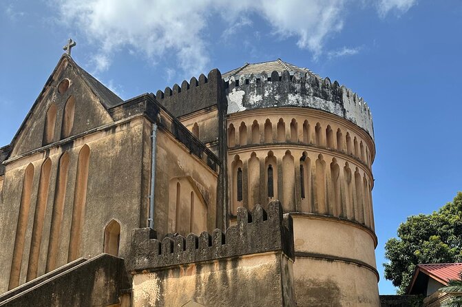Stone Town Walking Tour - Stop 3, Old Slave Market and Anglican Cathedral: serious history, held with care