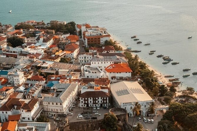 Stone Town Walking Tour with Hassan - House of Wonders: Oman power, scale, and street sightlines