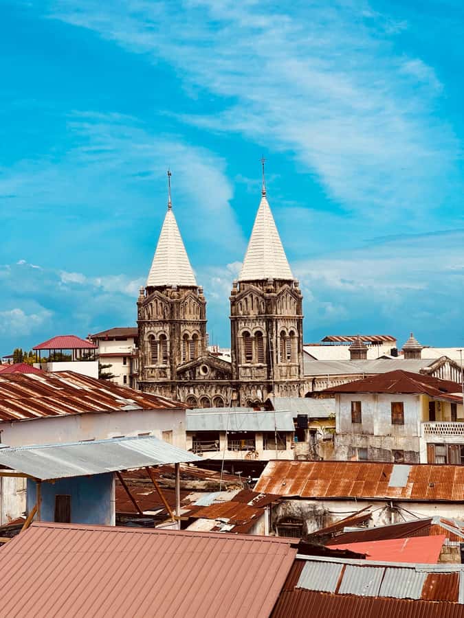 Stone Town Walking Tour With Local Expert Guide - The Landmark Walk: Slave Market to Cathedrals to Old Fort