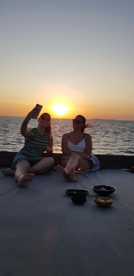 Zanzibar City: Sunset Sailing Tour with Snacks and Drinks - Who should book this Zanzibar sunset sailing tour