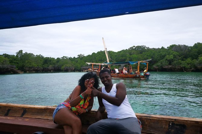 Zanzibar Dhow Cruise day adventure, sea sports at Kwale Island, very memorable - Snorkeling the coral reefs: the highlight for many people