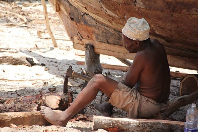 Zanzibar Full Day Mnemba Island, Nungwi and Kendwa Beach Tour - Nungwi Fishing Village, Fish Market, and Dhow Construction Areas