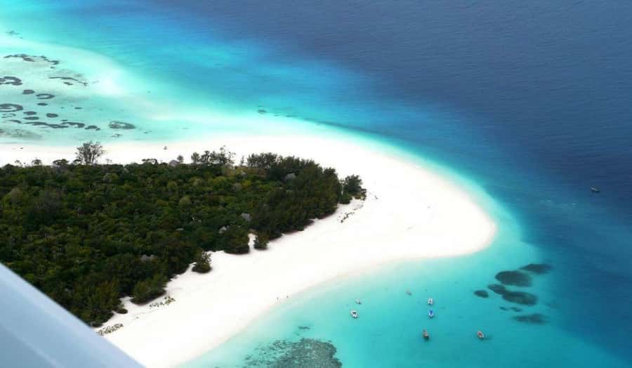 Zanzibar: Mnemba Island Atoll Guided Day Trip - Getting picked up smoothly in the Unguja South area