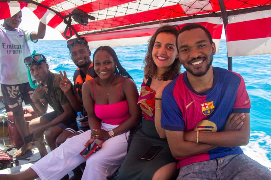 Zanzibar: Mnemba island Snorkeling & Boat Tour with Lunch - The Boat Ride and Timing: Van, Water Transport, and a Real Half-Day