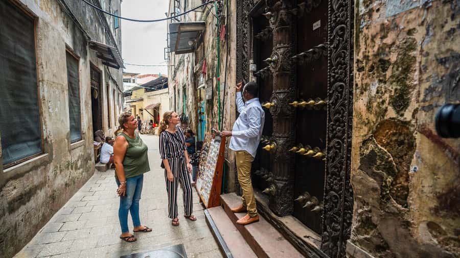Zanzibar: Stone Town, History and Jozani Forest Guided Tour - How hotel pickup and Zanzibar van rides shape the day