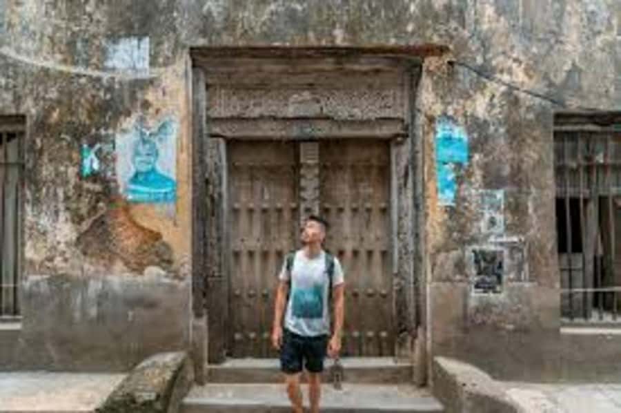 Zanzibar: Stone Town Walking Tour With Hotel Pickup - The Old Slave Market and Anglican Cathedral stop: heavy subject, important context